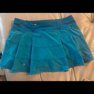 Green , Lululemon Tennis Skirt size 6. Good condition . No holes, no tears .